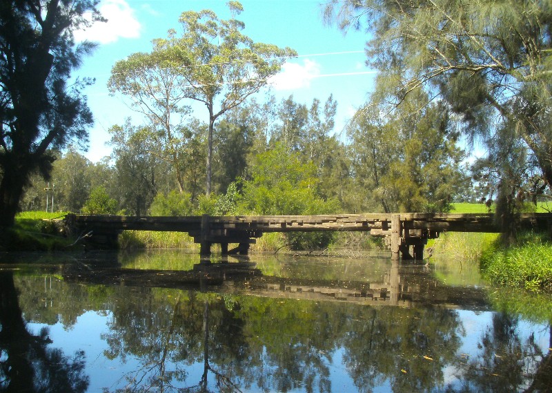 One of the wooden bridges spanning the creek